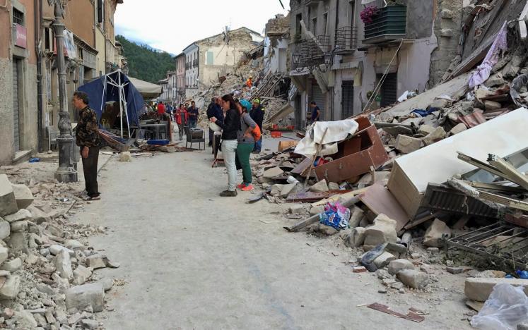 Rescuers work following an earthquake that hit Amatrice
