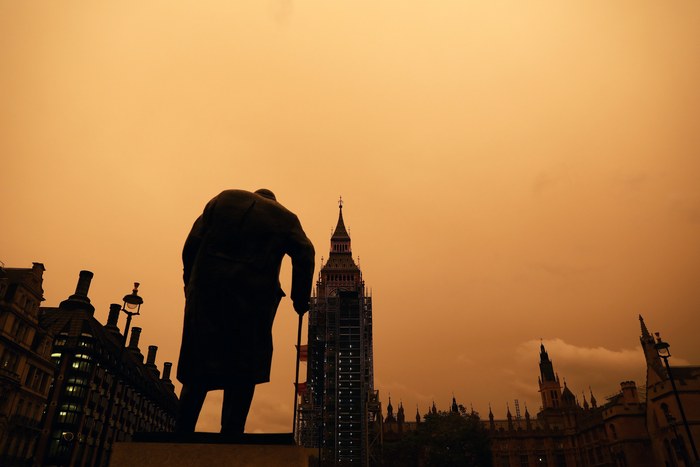 Clouds gather over a view of westminster in London, Britain